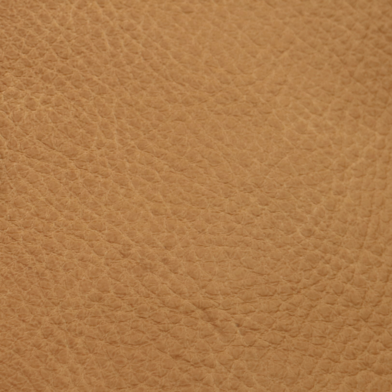 A luxurious, semi-aniline leather renowned for its softness and suppleness. It boasts a natural grain and a gently undulated finish, achieved through a careful buffing and milling process. This results in a durable yet relaxed aesthetic. Perfect for busy homes with pets or children.